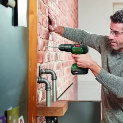 Accuboormachines|Boormachines > Bosch 18V klopboormachine UniversalImpact (Incl. 2 accu's 1.5Ah + lader)