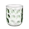 Glas met groene stippen