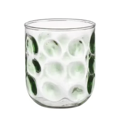 Glas met groene stippen